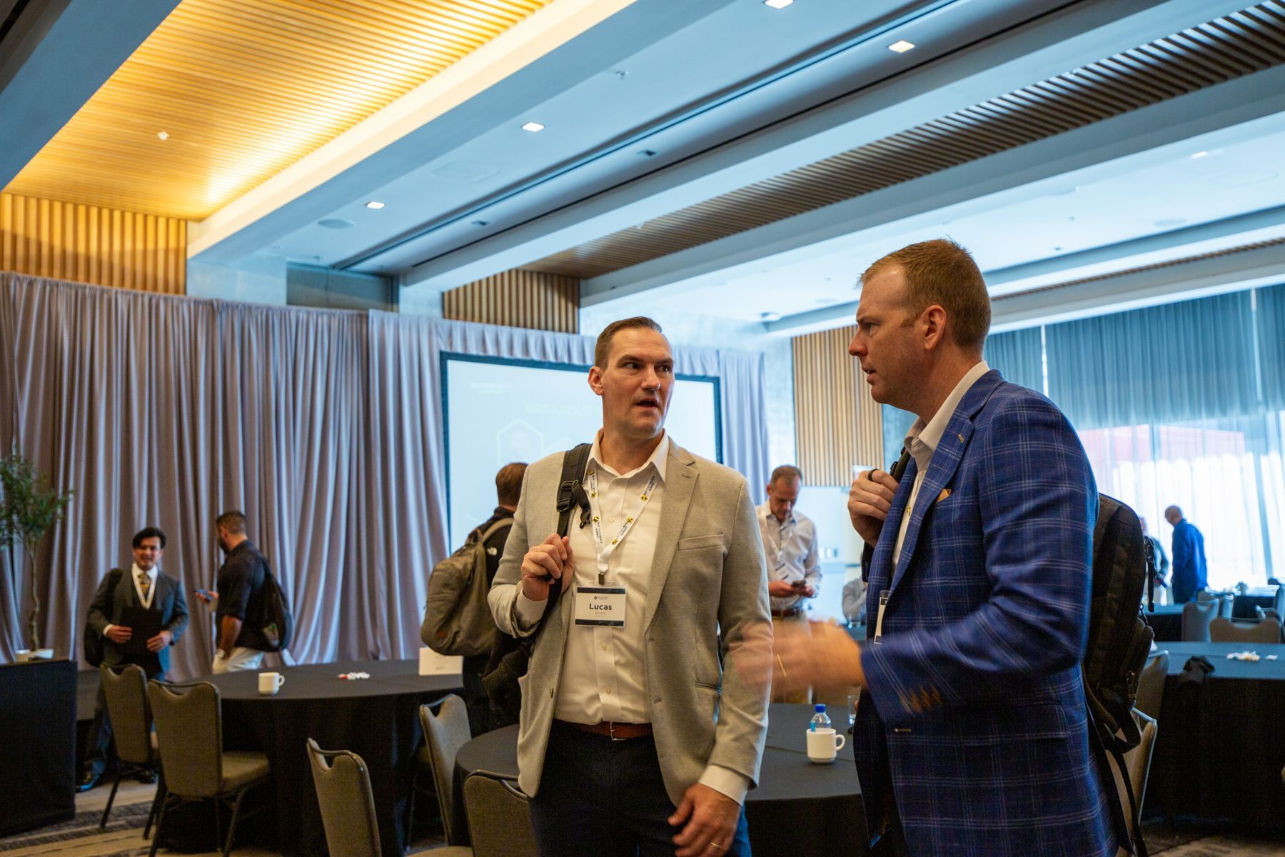 Two members in conversation at a Lab summit
